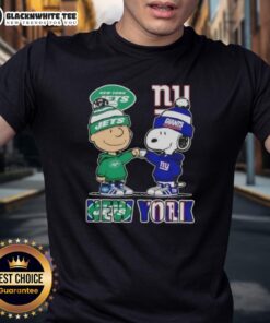Alt Text: Cute Charlie Brown and Snoopy fist bump on New York City Jets vs Giants T-Shirt, perfect for sports fans.
