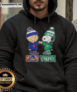 Alt Text: Cute Charlie Brown and Snoopy fist bump in Knicks and Jets hoodie, showcasing NYC sports spirit.