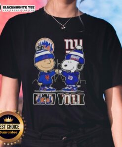 Alt Text: Cute Charlie Brown fist bump with Snoopy, NYC skyline, featuring Mets and Giants logos on a ladies tee.