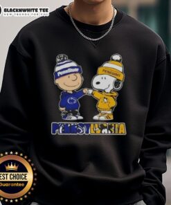 Charlie Brown fist bumping Snoopy in Nittany Lions vs. Pittsburgh Penguins sweatshirt design from Pennsylvania city.