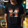 Alt Text: Cute Cincinnati Bengals Snoopy and Charlie Brown Best Friends T-Shirt featuring playful cartoon characters in team colors.