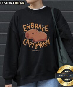 Alt Text: Cozy 'Cute Embrace Capybarism Do Nothing' sweatshirt featuring a capybara graphic, perfect for casual comfort.