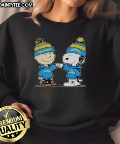 Alt Text: Cute Los Angeles Chargers Snoopy and Charlie Brown Best Friends sweatshirt featuring vibrant graphics and cozy design.
