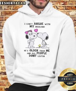 Cute Peanuts Snoopy hoodie with 'I cant argue with my husband, hes older' design, perfect for fans of Snoopy.