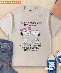 Cute Peanuts Snoopy t-shirt with 'I can't argue with my husband, he's older' design for humorous apparel.