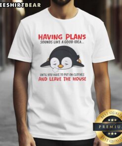 Alt Text: Cute penguin graphic on a T-shirt with the phrase about plans, humorously highlighting reluctance to leave the house.