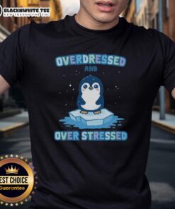 Cute penguin overdressed in a colorful outfit, looking stressed, featured on a fun t-shirt design for penguin lovers.