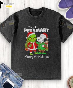 Alt Text: Cute PetSmart x Grinch and Snoopy Merry Christmas washed t-shirt featuring festive graphics and soft fabric.