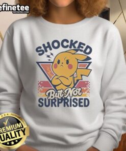 Alt Text: Cute Pikachu shocked but not surprised graphic on a retro sweatshirt, perfect for Pokmon fans and cozy style.