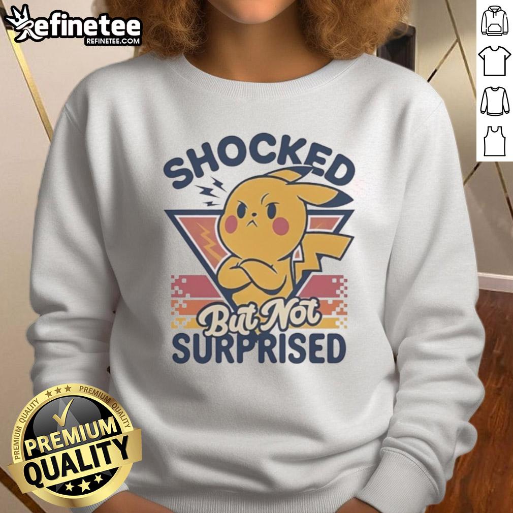 cute-pikachu-shocked-but-not-surprised-retro-sweatshirt Alt Text: Cute Pikachu shocked but not surprised graphic on a retro sweatshirt, perfect for Pokmon fans and cozy style.