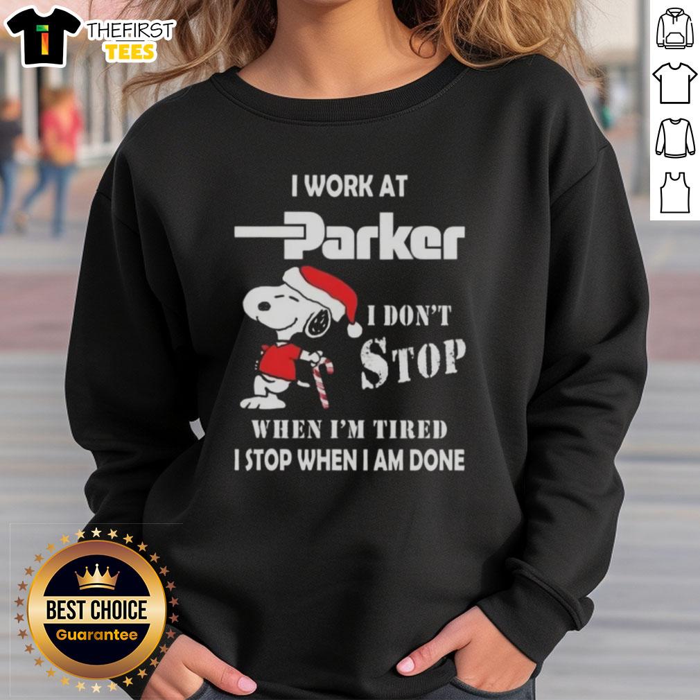 cute-snoopy-i-work-at-parker-hannifin-i-dont-stop-when-im-tired-i-stop-when-i-am-done-christmas-sweatshirt Alt Text: Cute Snoopy Christmas sweatshirt for Parker Hannifin employees, featuring I don't stop when I'm tired, I stop when I'm done.
