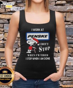 Cute Snoopy Christmas tank top with 'I Work At Penske Corporation, I Don't Stop When I'm Tired, I Stop When I'm Done' design.
