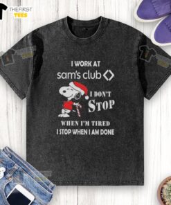 Alt Text: Cute Snoopy graphic on a Christmas t-shirt that says I work at Sam's Club, I don't stop when I'm tired.
