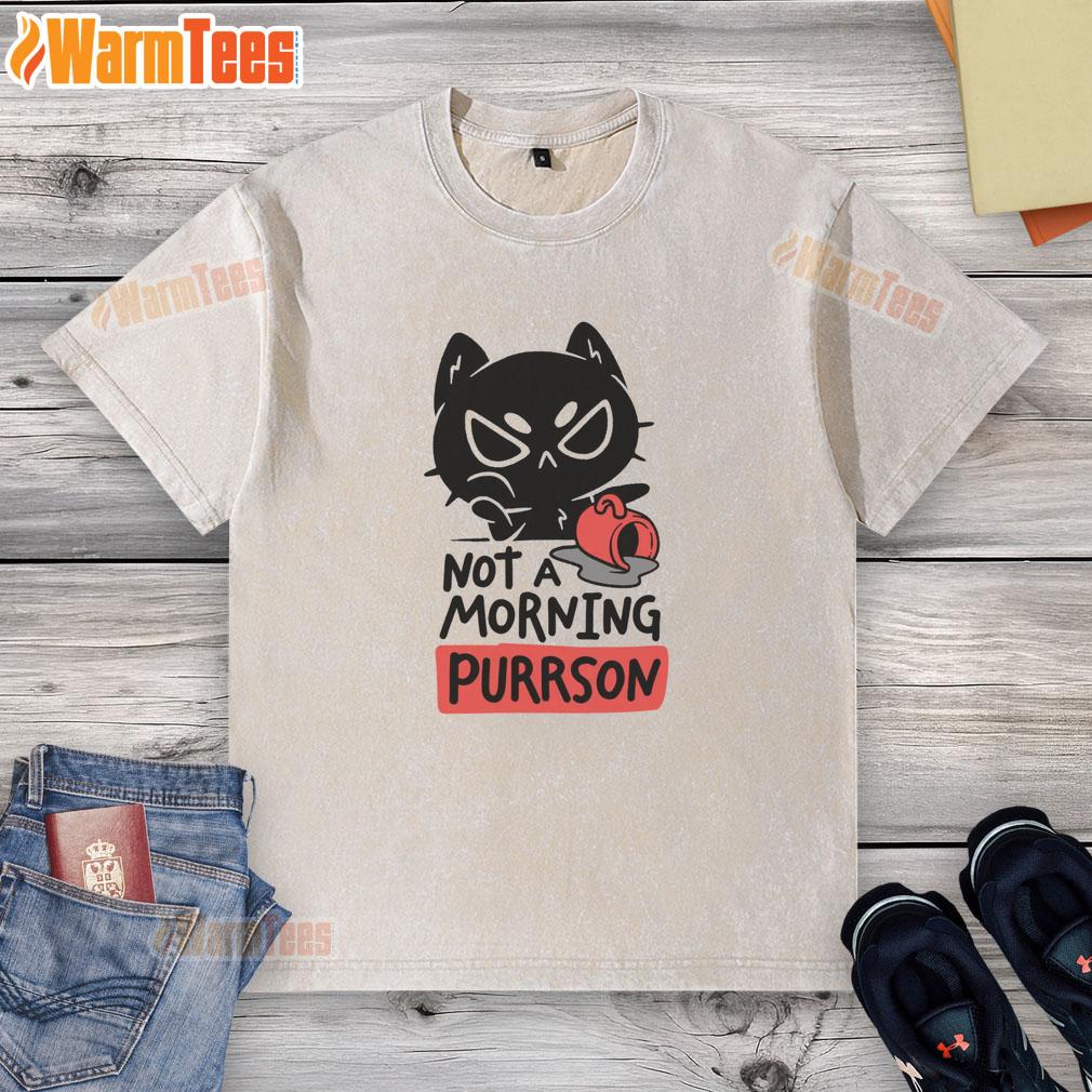 funny-cat-not-a-morning-purrson-washed-t-shirt Funny cat wearing a 'Not a Morning Purrson' washed t-shirt, showcasing its playful attitude and humor.