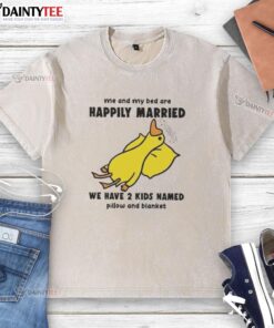 Funny duck on a bed with a washed t-shirt saying Me and my bed are happily married with kids named Pillow and Blanket.