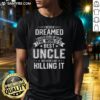 Funny 'World's Best Uncle' T-shirt featuring humorous text about uncle pride and family love, perfect for gifts.