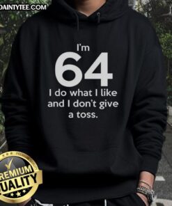 Funny hoodie featuring 'I'm 64, I do what I like and I don't give a toss' design, perfect for a humorous gift.