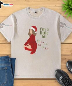 Funny I'm A Little Bit Fa La Christmas washed t-shirt featuring festive graphics, perfect for holiday celebrations.