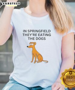 Funny Springfield They're Eating the Dogs Ladies Tee design featuring a humorous cartoon dog graphic on a stylish shirt.