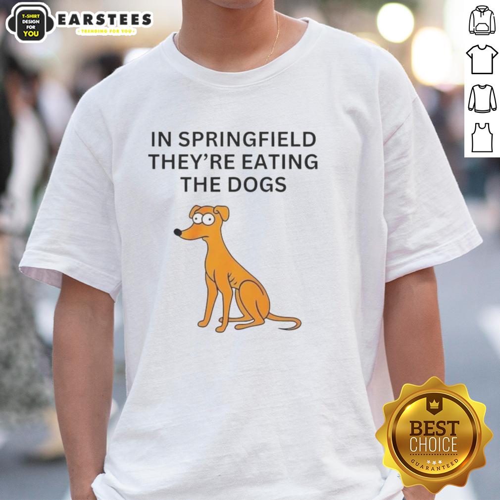 funny-in-springfield-theyre-eating-the-dogs-t-shirt-1 Alt Text: Funny In Springfield They're Eating The Dogs T-Shirt featuring a humorous cartoon dog design and vibrant colors.