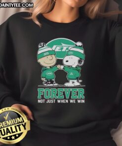 Funny New York Jets X Charlie Brown sweatshirt featuring Snoopy with 'Forever, Not Just When We Win' slogan.