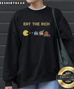 Funny Pacman Eat the Rich sweatshirt featuring Pacman chasing coins, perfect for quirky fashion lovers.