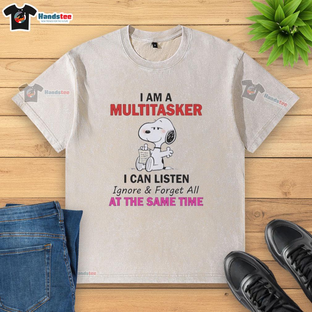 Alt Text: Funny Snoopy multitasker t-shirt featuring the quote 'I can listen, ignore, and forget all at the same time.'