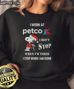 Funny Snoopy sweatshirt for Petco employees, featuring a humorous quote about hard work and holiday spirit.