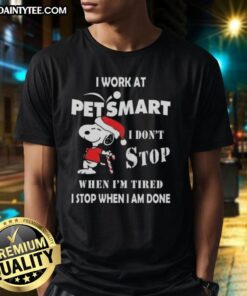 Funny Snoopy Christmas T-shirt with the quote I work at Petsmart, I don't stop when I'm tired, I stop when I'm done.