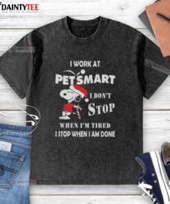 Funny Snoopy Christmas t-shirt design featuring the phrase about working at PetSmart, perfect for pet lovers.