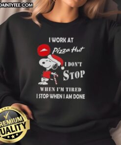 Alt Text: Funny Snoopy Christmas sweatshirt featuring I work at Pizza Hut, I don't stop when I'm tired, I stop when I'm done.