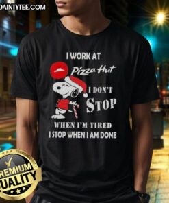 Funny Snoopy Christmas T-Shirt featuring 'I Work At Pizza Hut I Dont Stop When Im Tired, I Stop When I Am Done' slogan.