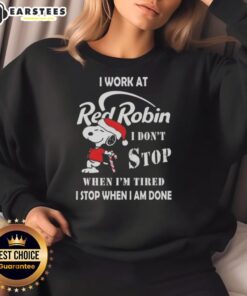 Funny Snoopy Christmas sweatshirt for Red Robin staff, featuring the quote about working hard until done.