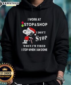 Funny Snoopy Christmas hoodie with 'I don't stop when I'm tired, I stop when I'm done' text design.