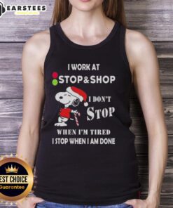 Alt Text: Funny Snoopy Christmas tank top with 'I work at the stop supermarket, I don't stop when I'm tired' slogan.