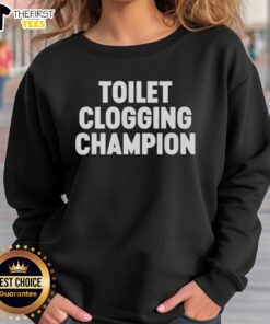 Funny Toilet Clogging Champion Sweatshirt featuring a humorous graphic, perfect for plumbing jokes and casual wear.