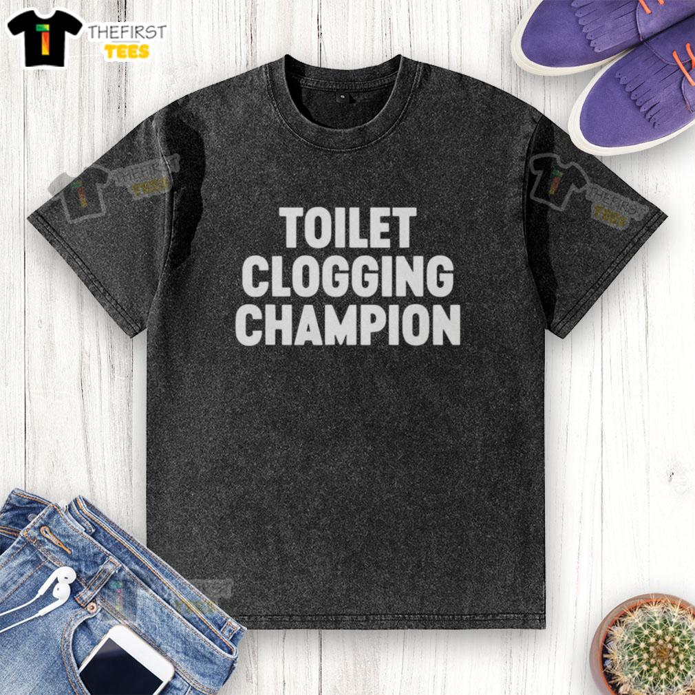 funny-toilet-clogging-champion-washed-t-shirt Funny Toilet Clogging Champion washed t-shirt featuring a humorous design for bathroom humor enthusiasts.