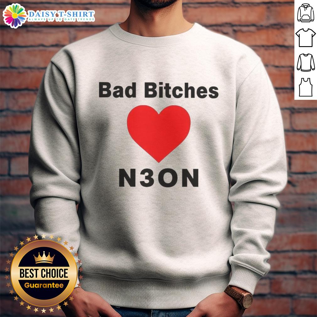 Good Bad Bitches Love Neon Sweatshirt Women wearing a 'Good Bad Bitches Love Neon' sweatshirt in vibrant neon colors, showcasing trendy streetwear fashion.