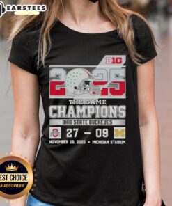Ohio State Buckeyes champions celebrate victory at Michigan Stadium, wearing ladies' tee for Big Ten The Game.