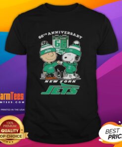 Alt Text: Good Charlie Brown fist bump with Snoopy on a New York Jets skyline t-shirt for the 66th anniversary, 1960-2026.