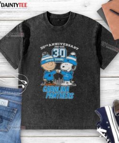 Good Charlie Brown X Snoopy 30th Anniversary T-Shirt featuring Carolina Panthers skyline design, perfect for fans.