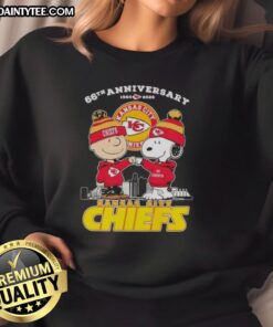 Alt Text: Good Charlie Brown X Snoopy 66th Anniversary sweatshirt featuring Kansas City Chiefs skyline design, 1960-2026.