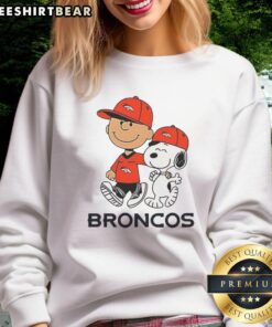 Good Denver Broncos NFL X Peanuts Snoopy and Charlie Brown sweatshirt featuring vibrant graphics and cozy design.