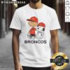Good Denver Broncos NFL x Peanuts Snoopy and Charlie Brown T-shirt featuring fun cartoon graphics and team colors.