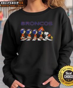 Good Denver Broncos X Peanuts Snoopy and Friends Abbey Road sweatshirt featuring playful characters in a football theme.