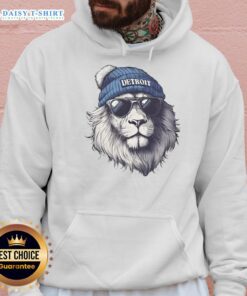 Alt Text: Detroit Lions mascot wearing a beanie and sunglasses, sporting a hoodie, showcasing team spirit and style.