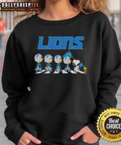 Detroit Lions X Peanuts Snoopy and Friends Abbey Road sweatshirt featuring iconic characters in a fun NFL design.