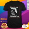Alt Text: Good Don't Try To New York Our Florida Pistol T-Shirt featuring bold graphic design and vibrant colors.