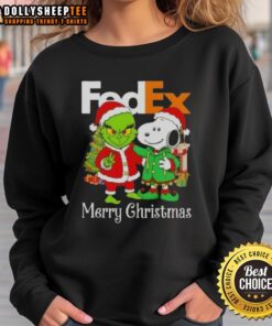 Alt Text: Good FedEx x Grinch and Snoopy Merry Christmas sweatshirt featuring festive designs for holiday cheer.
