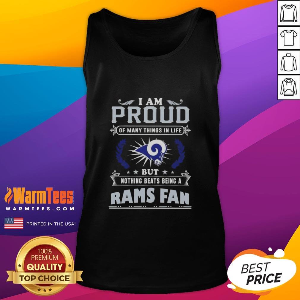 good-i-am-proud-of-many-things-in-life-but-nothing-beats-being-a-los-angeles-rams-fan-tank-top Los Angeles Rams fan proudly wearing a tank top that says 'Good I Am Proud Of Many Things In Life' at a game.